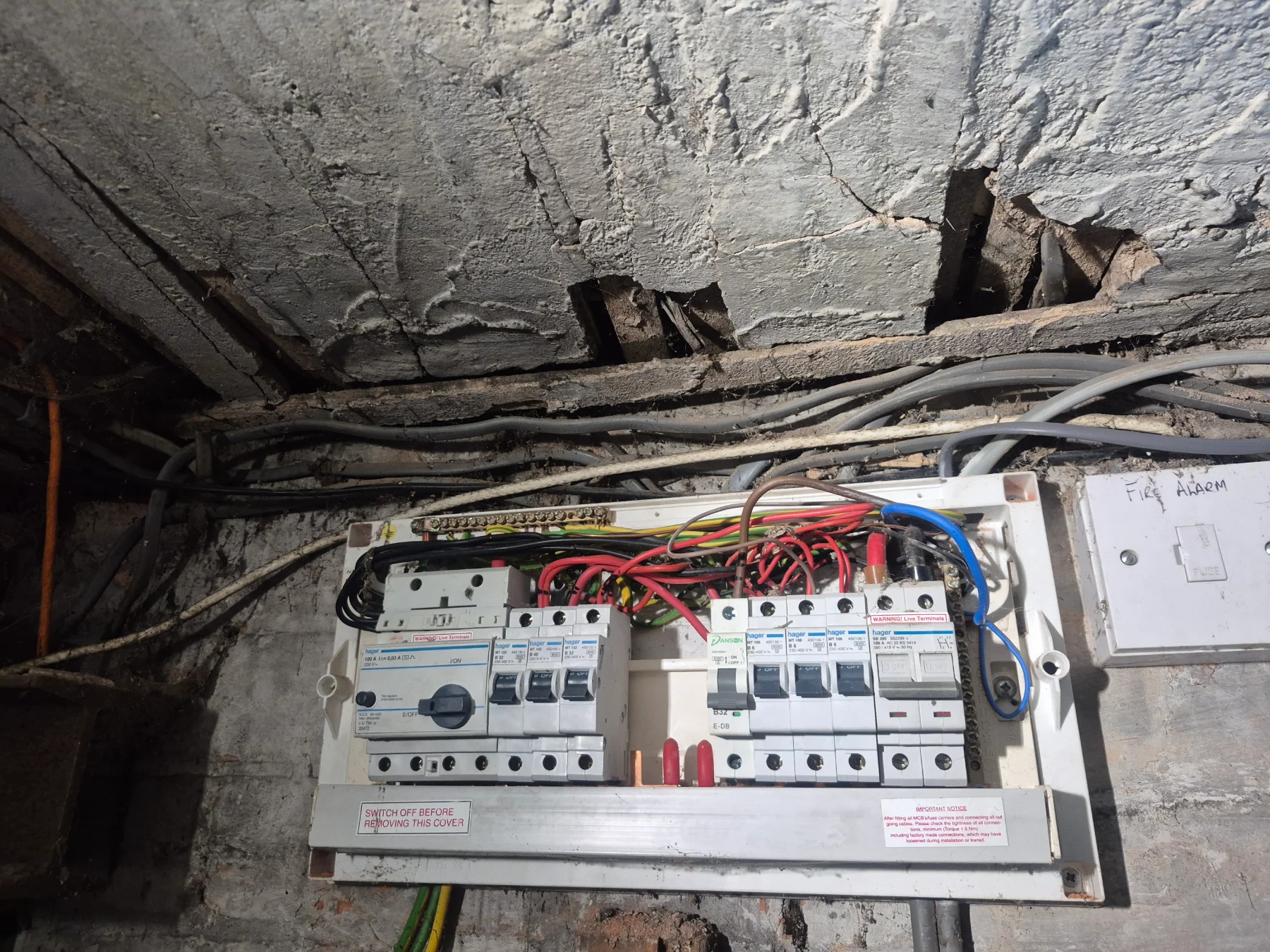 Electrical panel with exposed wiring